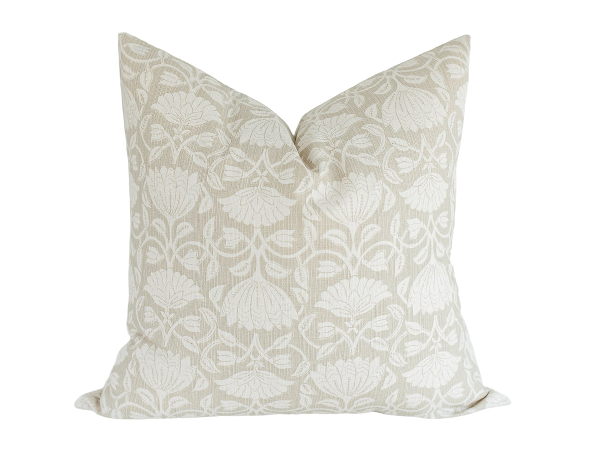 Showcases a delicate floral pattern with intricate ivory detailing on a soft, textured neutral backdrop.