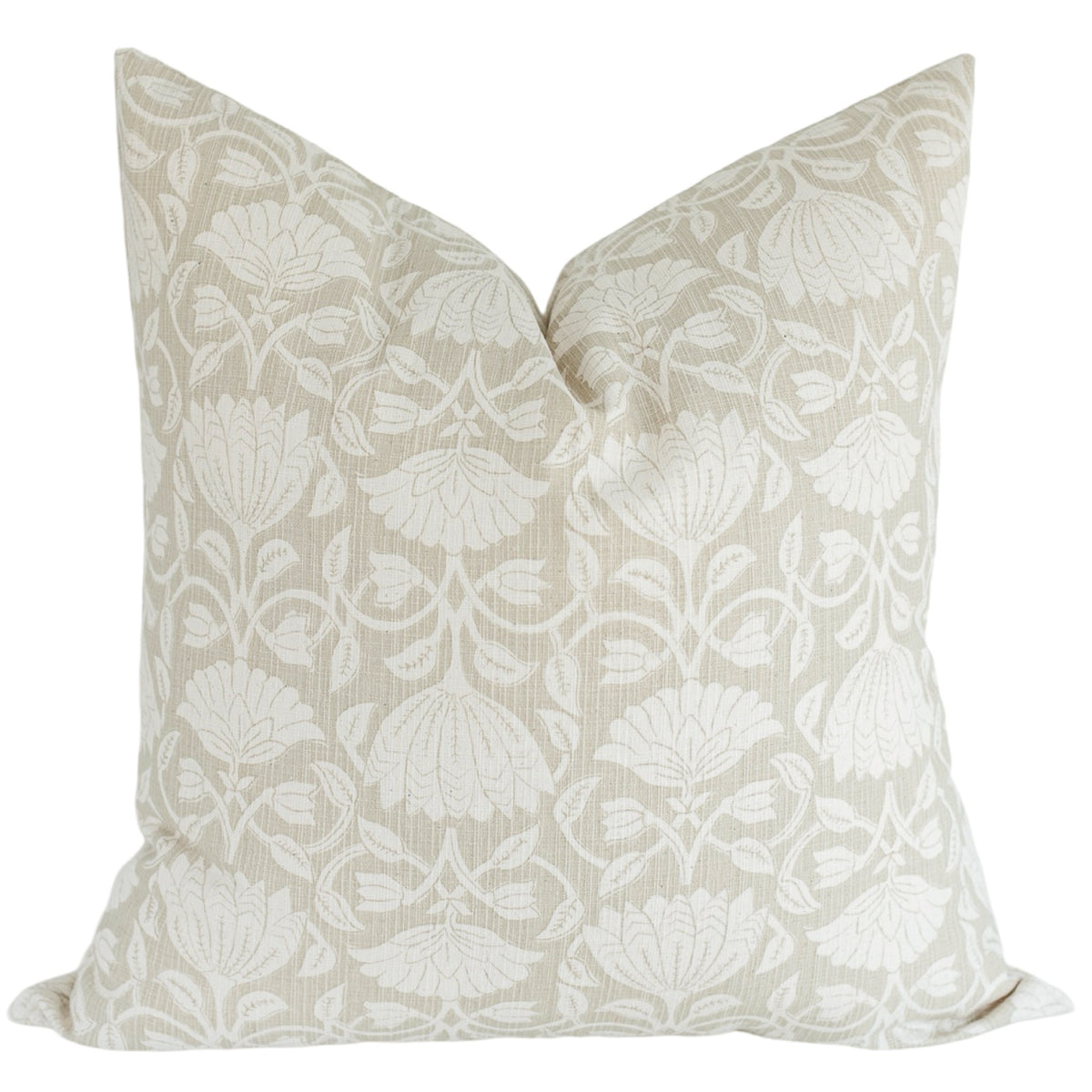 August floral block print pillow cover featuring an ivory and beige botanical pattern on textured fabric with a designer knife-edge finish.