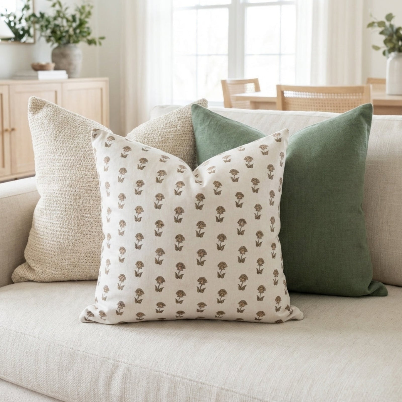 Close-up of Single-Sided Combo 2 pillow covers on a neutral-toned sofa, highlighting crisp edges, micro-texture, and floral patterns.