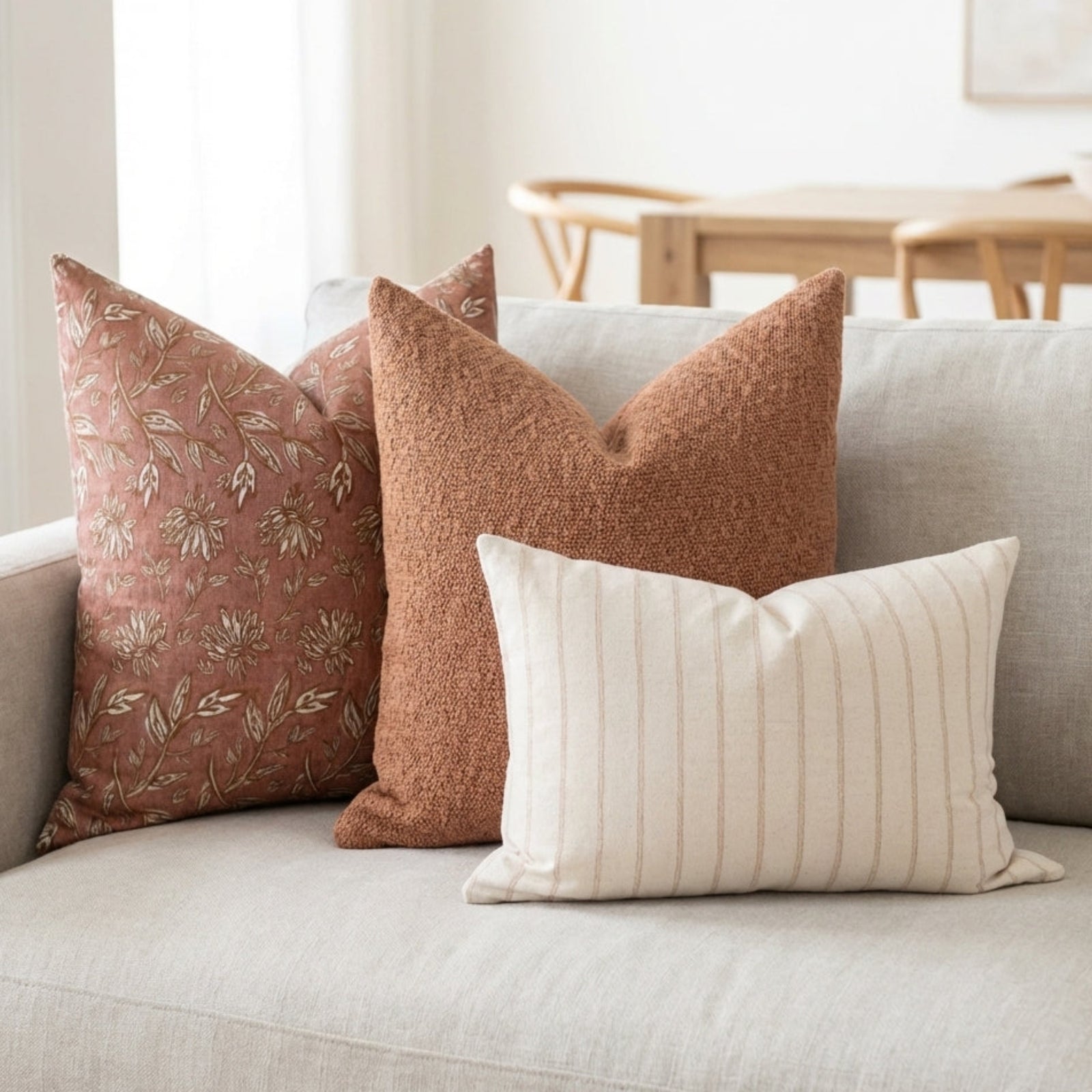 Neutral-toned sofa adorned with handmade textured pillows from the Terracotta Sofa Combo 4, creating a warm, inviting living space.