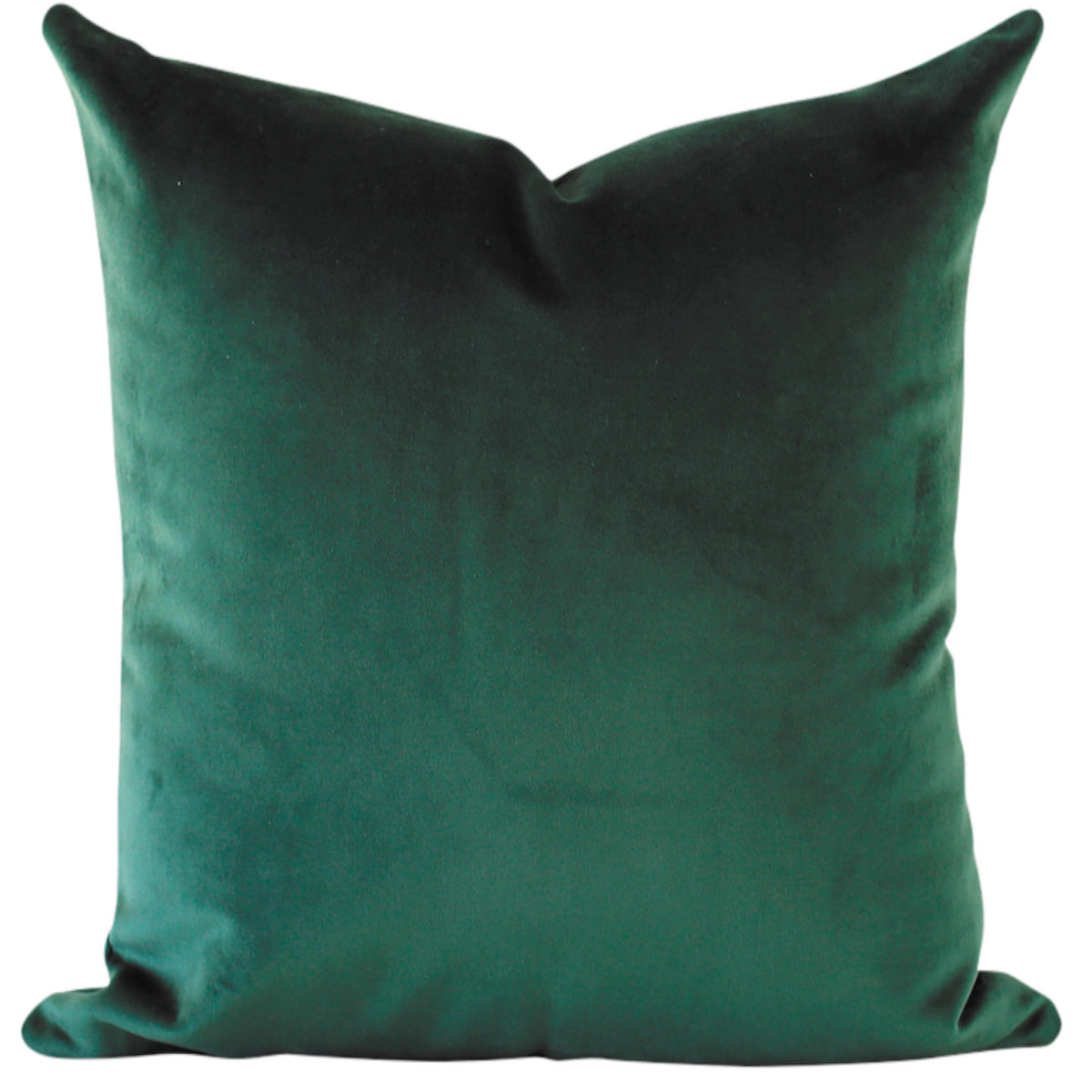 This pillow features a rich emerald green color with a luxurious, velvety fabric that has a soft and plush texture.