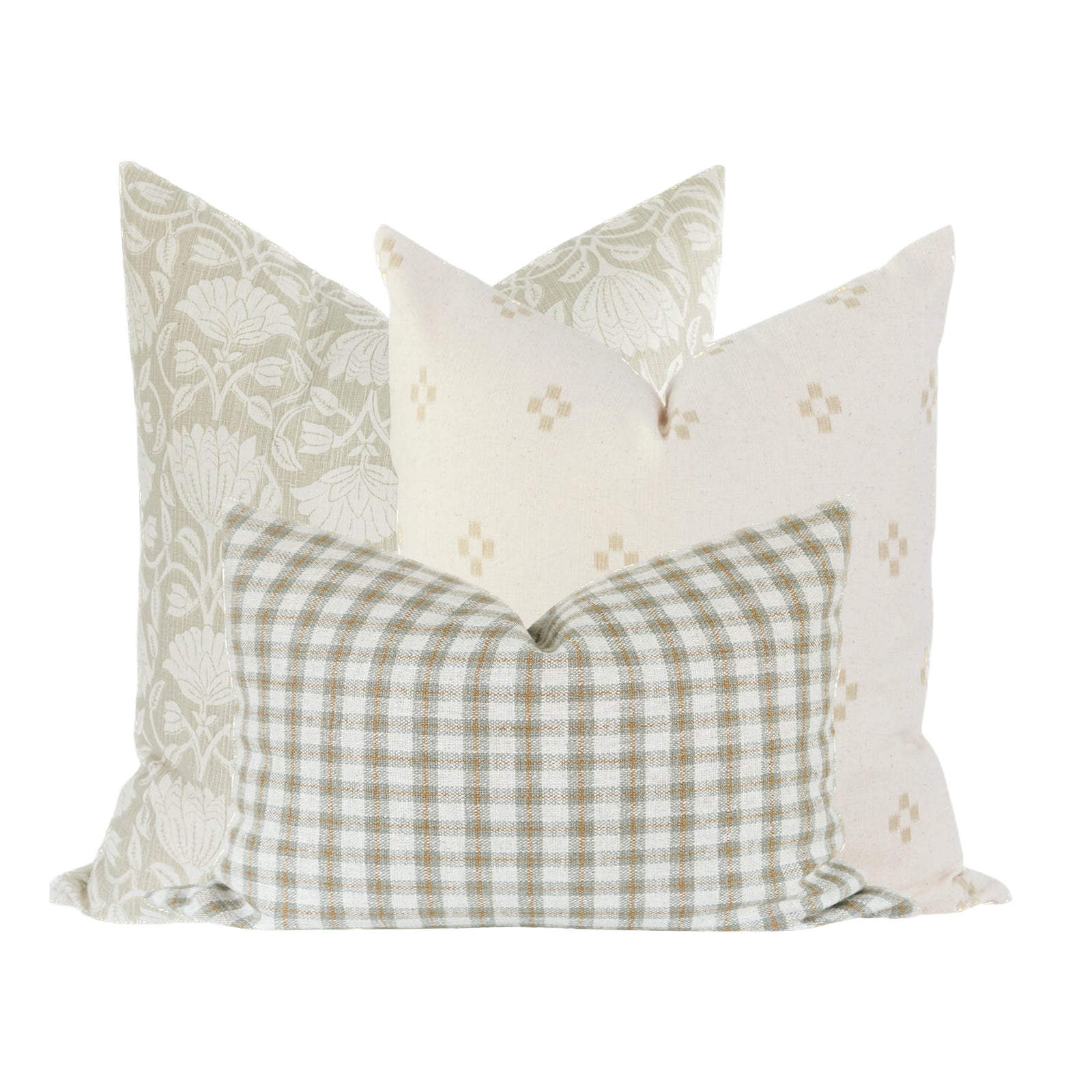 Cozy sofa scene with the Hailee Sofa Combo 3 pillows featuring subtle patterns and textures on a soft, airy fabric sofa, in a minimalist modern setting.