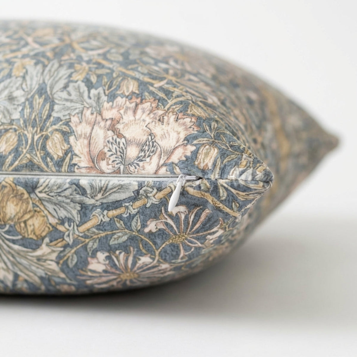 Macro view of Marlow Pillow Cover highlighting textured fabric surface and concealed zipper with soft studio lighting and shallow depth of field.