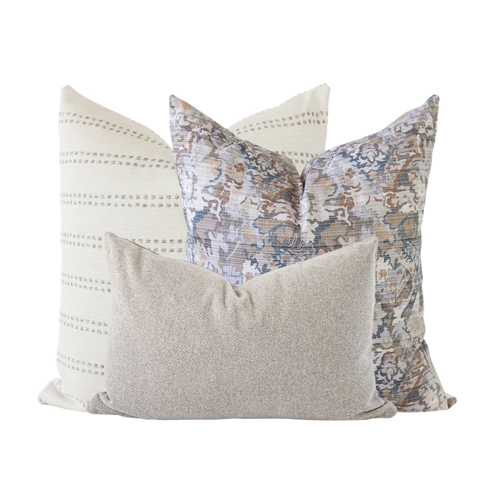 Three pillow covers from the Combo 20 set arranged on a neutral-toned airy sofa, highlighting their textures and natural, minimalist aesthetic.