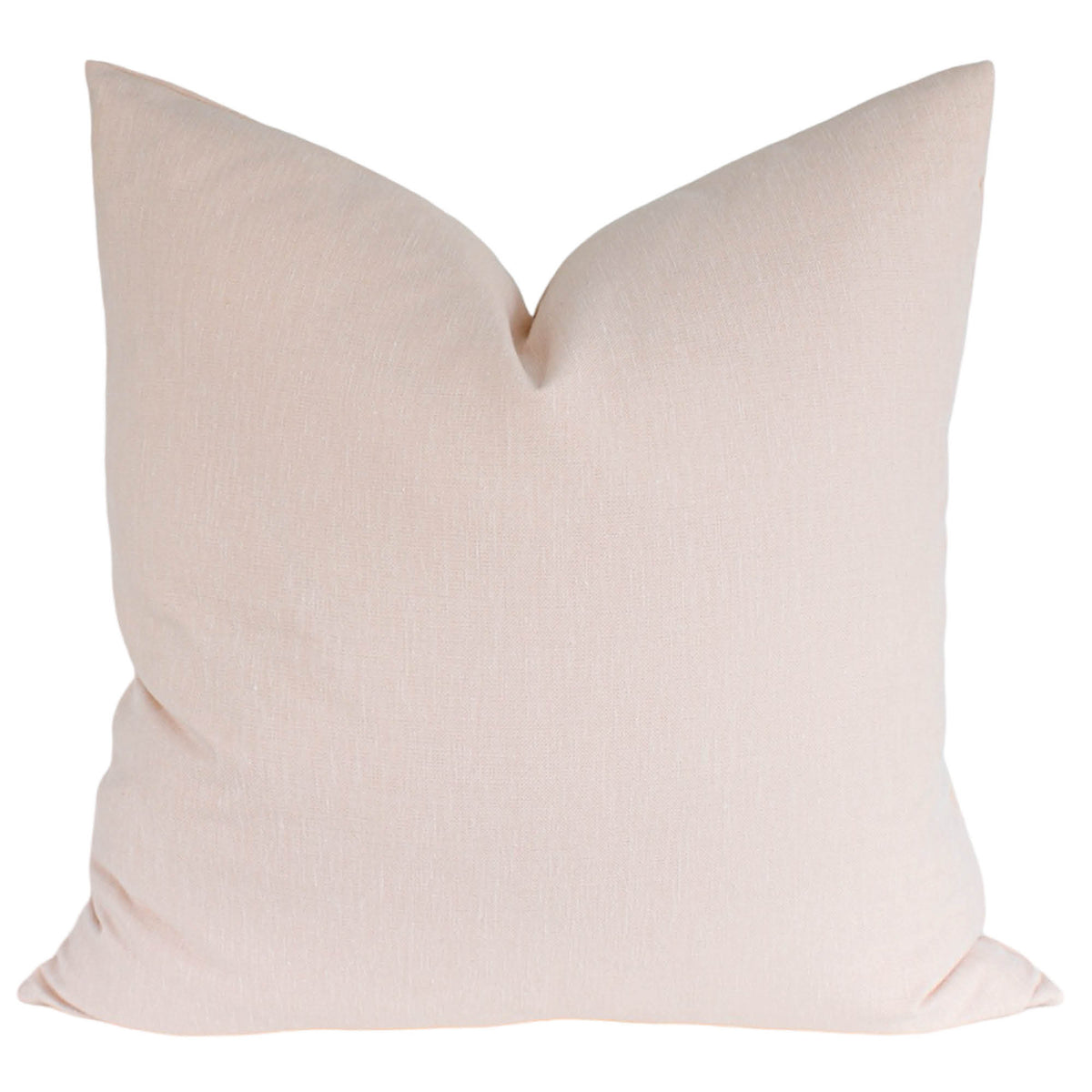 A solid light blush color on a soft fabric.