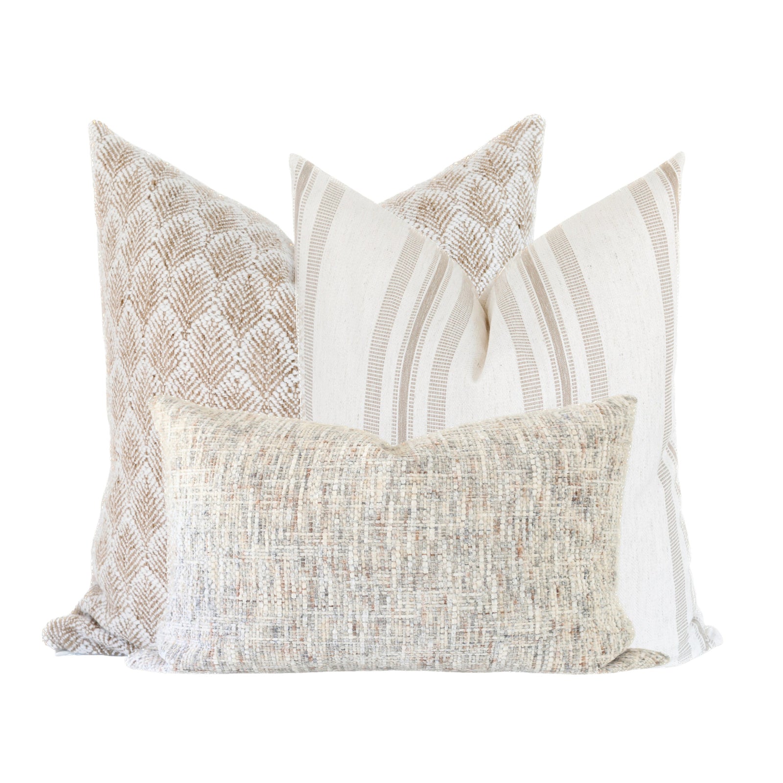 Close-up of Whitaker Sofa Combo 2 pillows showing woven textures and seamless white zippers on a neutral-toned modern sofa.